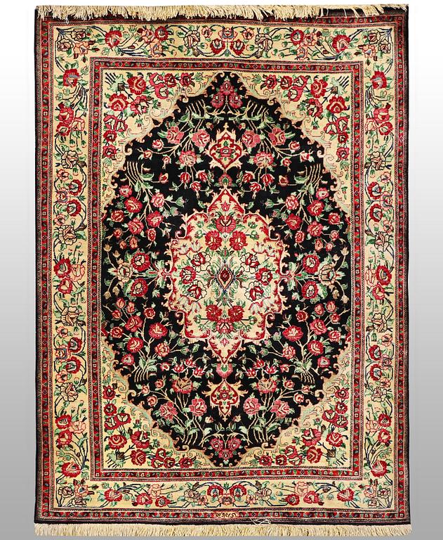 A rug, silk Qum, ca 150 x 103 cm.