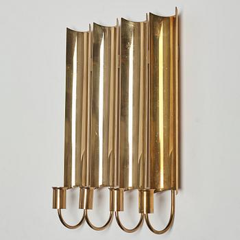 A set of four 'Reflex' brass wall scones by Pierre Forsell, Skultuna.