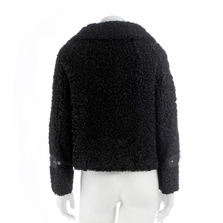 GUCCI, a black persian lamb jacket, size 40.