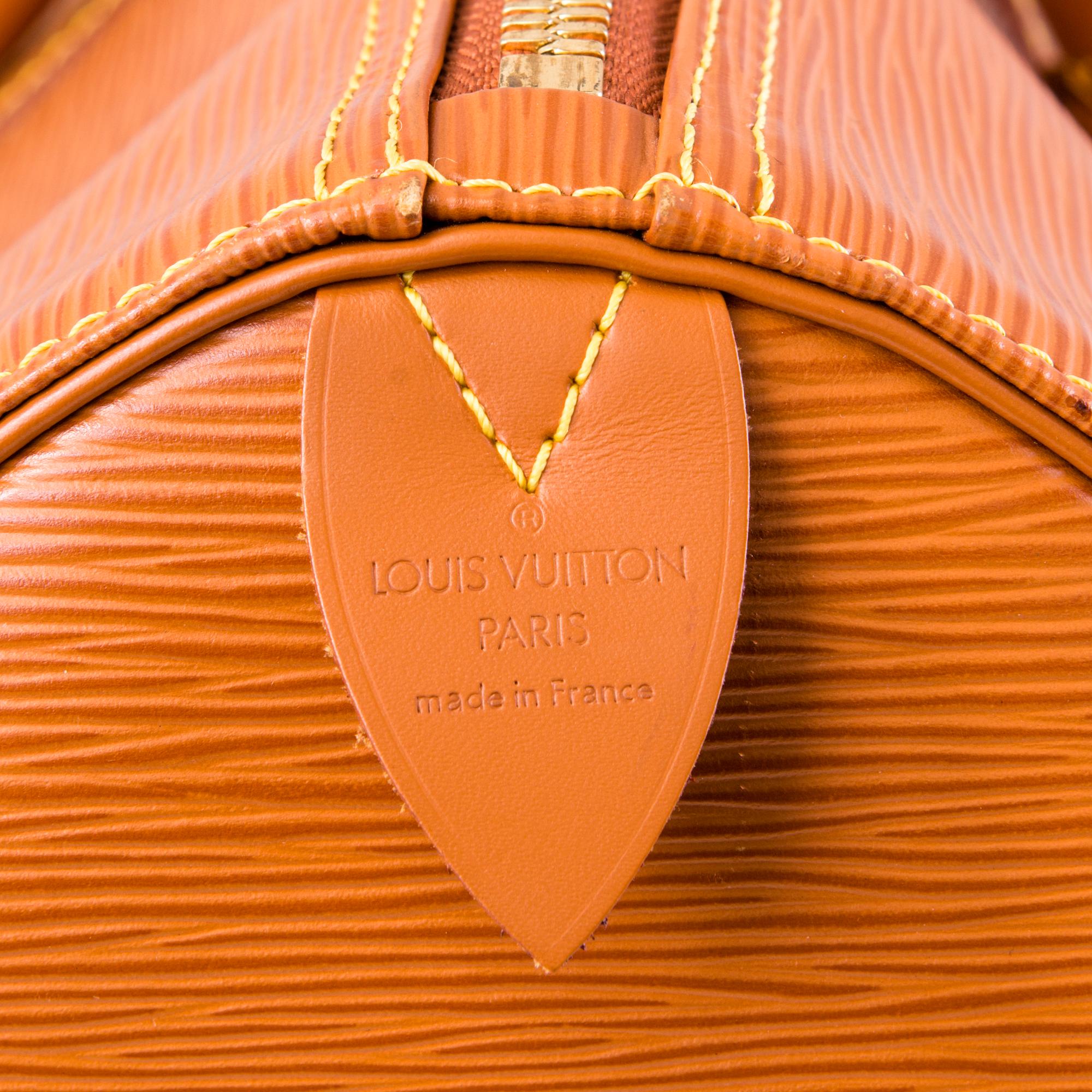 LOUIS VUITTON CIPANGO GOLD KEEPALL 50 EPI TRAVEL BAG.