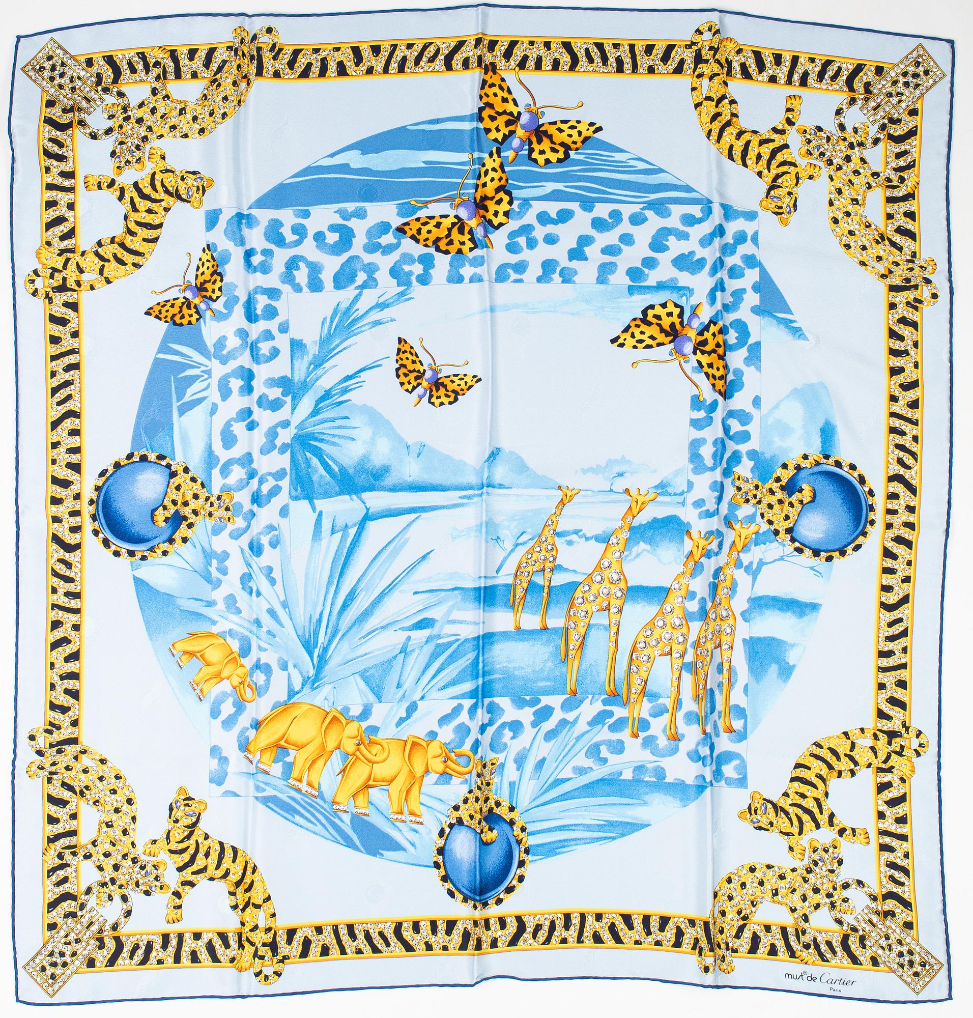 Cartier, a 'Savane Africiane' jacquard silk scarf.
