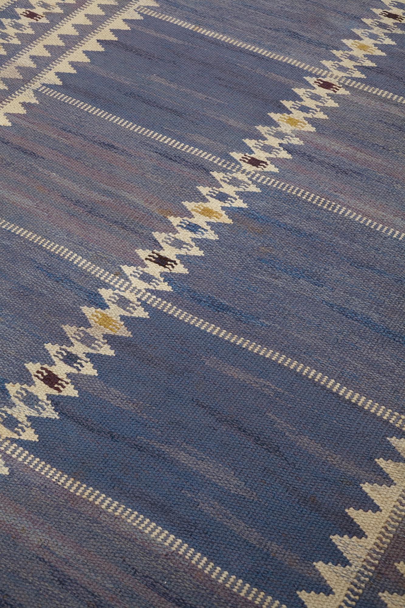 Barbro Nilsson, a carpet, "Salerno blå", flat weave, ca 312 x 201,5-205,5 cm, signed AB MMF BN.