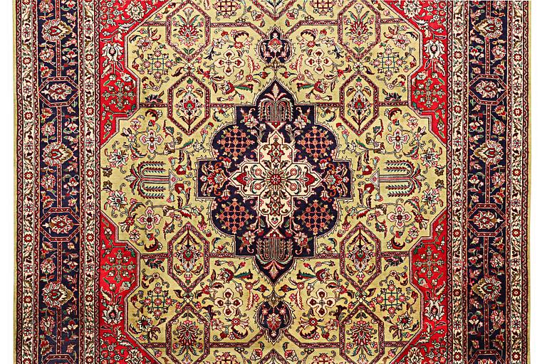 A carpet, Tabriz, c. 384 x 301 cm.