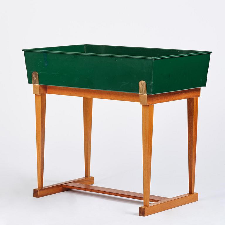Josef Frank, a rare flower table with green lacquered box model B 2084, Firma Svenskt Tenn, 1950-60s.