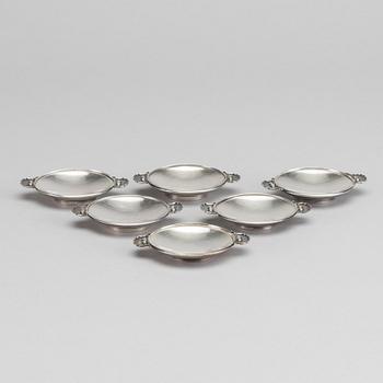 A Danish 20th century sterling set of six ashtrays, mark of G Jensen Copenhagen first half of the 19th century.