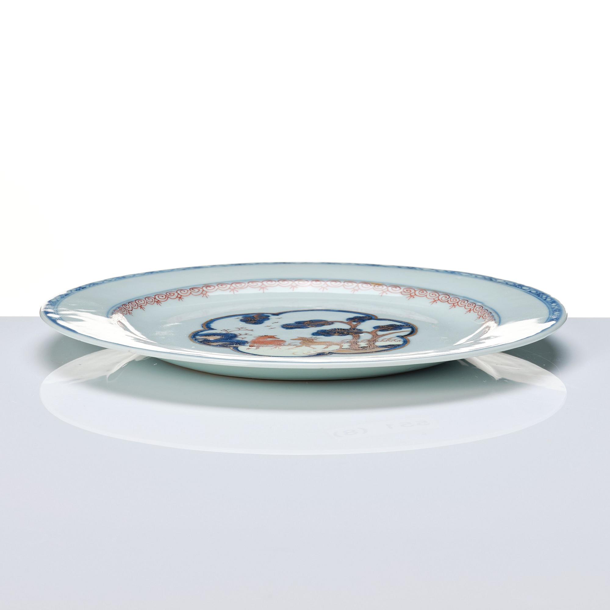 Tallrikar, åtta stycken, kompaniporslin. Qingdynastin, Qianlong (1736-95).