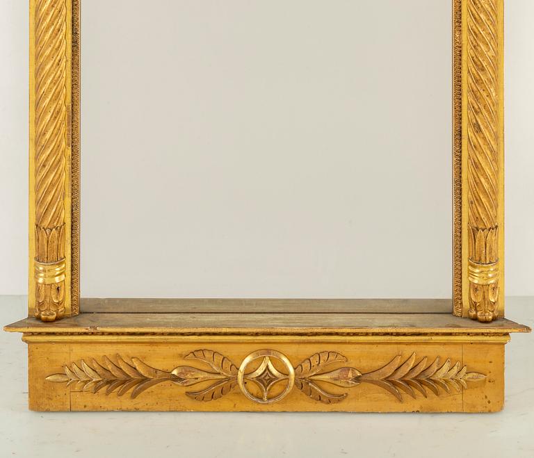 An Empire mirror from the first half of the 19th century.
