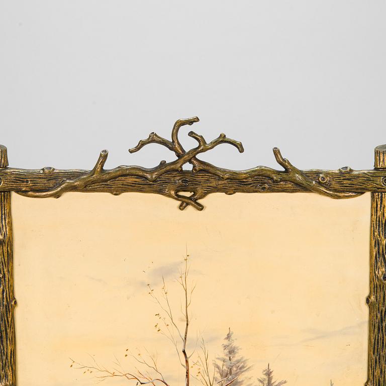 A late 19th-century fireplace screen.