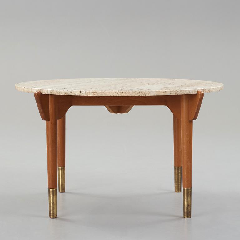 A Swedish Modern travertine top coffee table, mid 20th century.