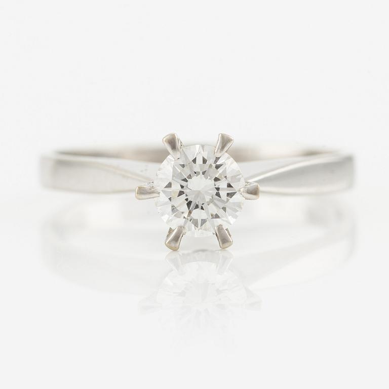 An 18K white gold ring set with a round brilliant-cut diamond 0.53 ct TW/if according to engraving.