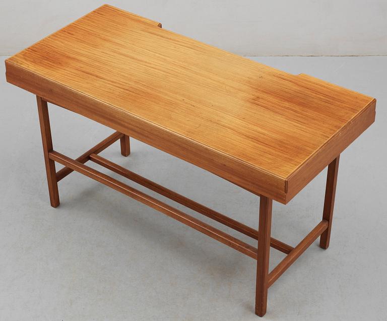 A Josef Frank mahogany and walnut desk by Svenskt Tenn.
