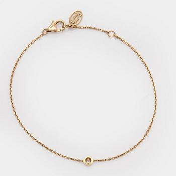 Cartier, armband, "d'Amour", 18K guld med en briljantslipad diamant.