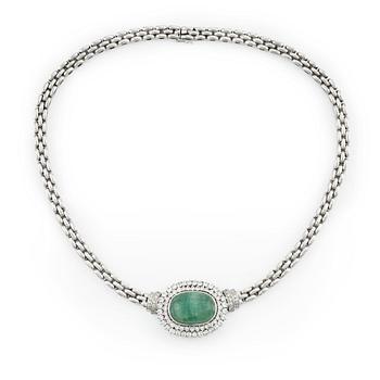 An 18K white gold necklace with a cabochon-cut emerald and round brilliant-cut diamonds.