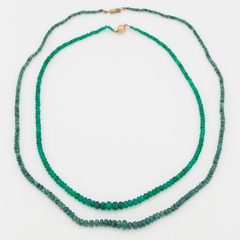 TWO NECKLACES, with emerald and probably green tourmaline.