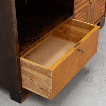 A stained birch sideboard/book case, 1920's/30's.