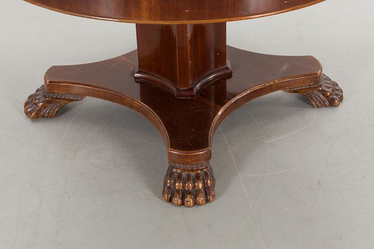 AN EMPIRE STYLE TABLE FROM AROUND 1900.