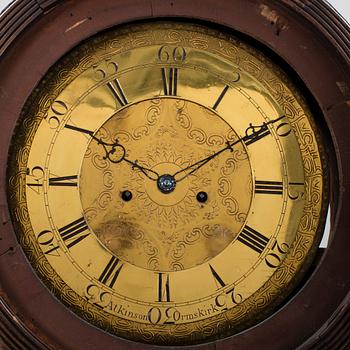 A 19th century Longcase Clock with arched brass dial inscribed Thomas Atkinson, Ormskirk, England.