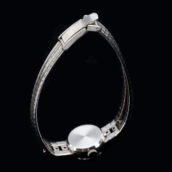 DAMARMBANDUR, 14 k vitguld med briljantslipade diamanter ca 0,20 ct, Provita. Vikt ca 18 g.