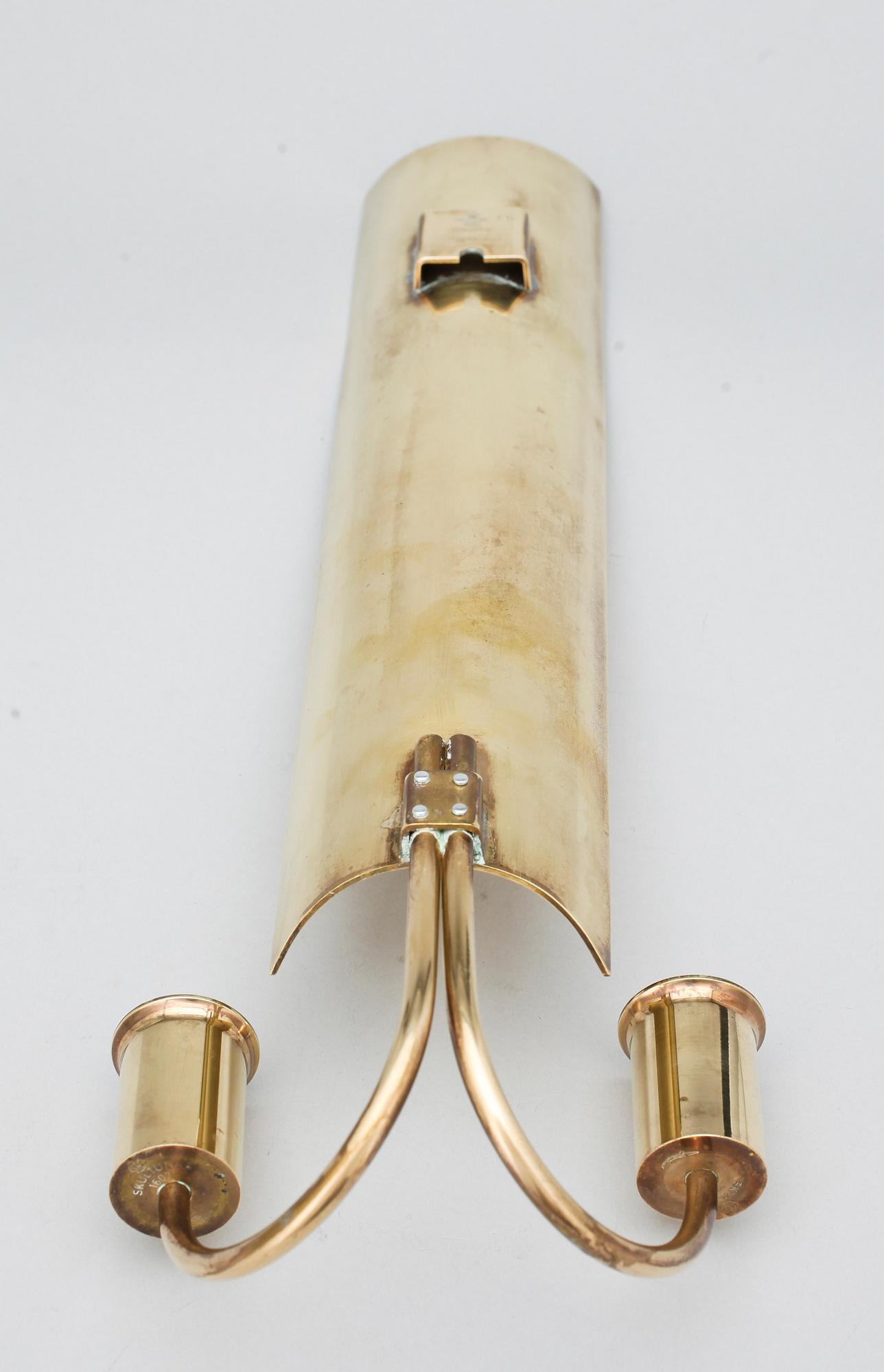 VÄGGLAMPETTER, ett par, mässing, "Reflex", Pierre Forsell, Skultuna, 1980.