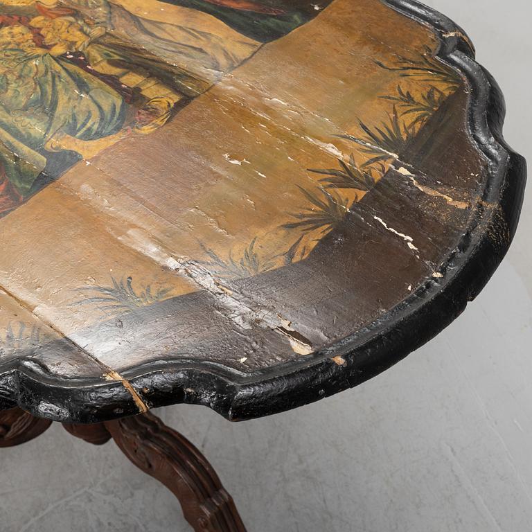 A transitional drop-leaf table, mid 18th Century.