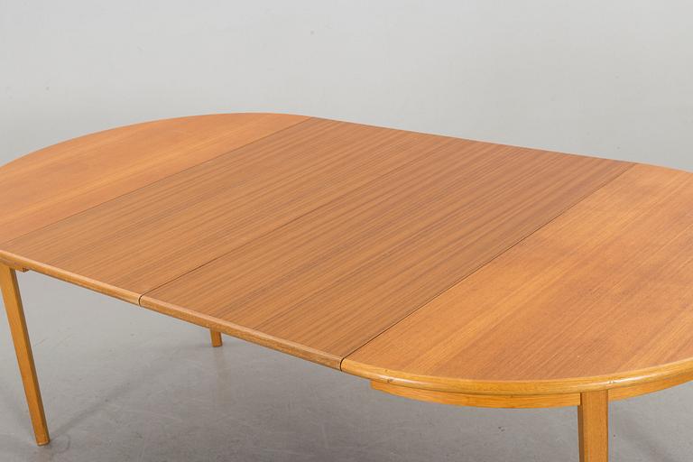 A 1960s teak veneered dining table by Bertil Fridhagen, Bodafors,