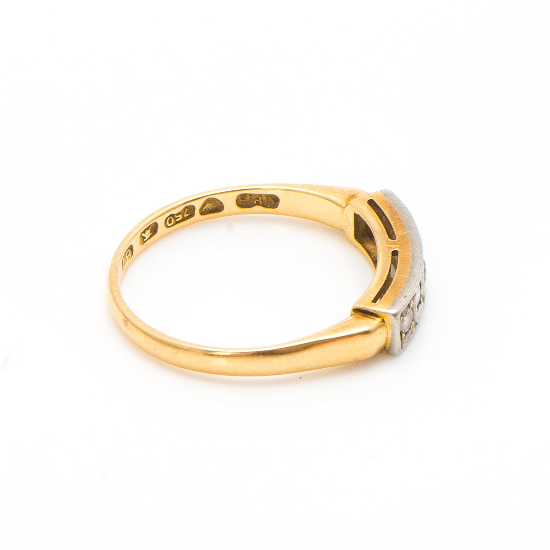 An 18K gold ring with diamonds ca. 0.22 ct in total. Päiviö Veikko, Turku 1955.