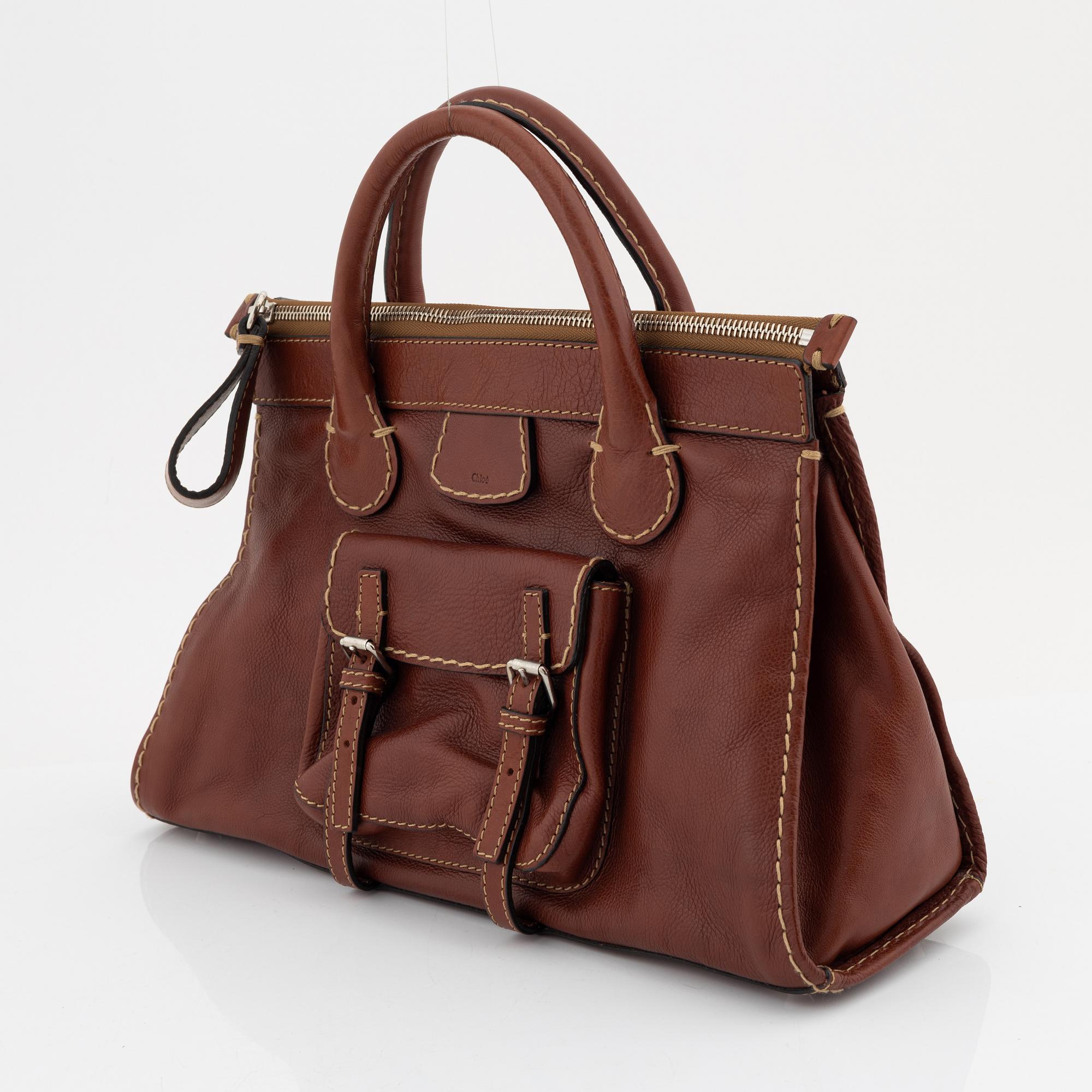 Chloé, a brown leather handbag.