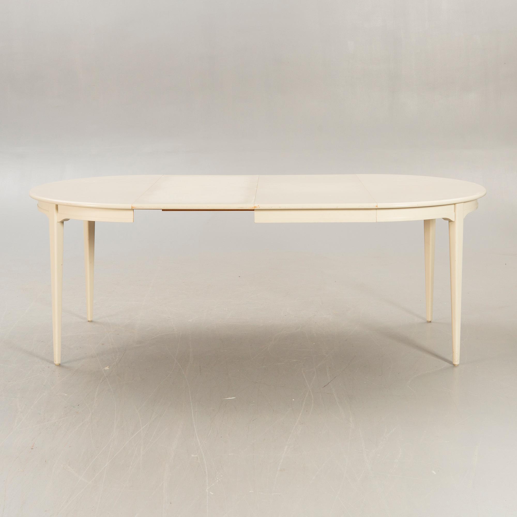 Svante Skogh, dining table plus 2 extension leaves, 4 chairs, second half of the 20th century.