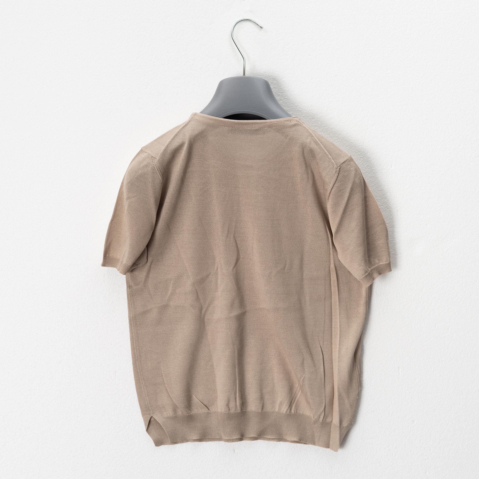 Prada, a set of three silk tops, size 40.