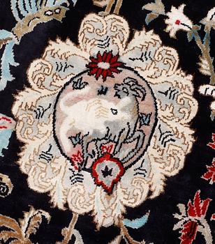A carpet, Figural Silk Qum, ca 309 x 200 cm.
