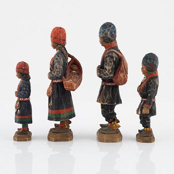 Torborg Lindberg, four carved and painted wooden figures, signed T.L.