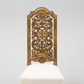 A carved Baroque style chair, second half of the 19th Century.