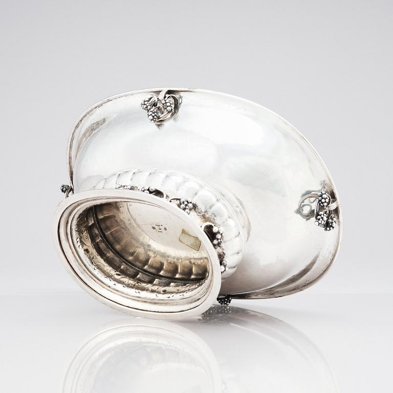 Georg Jensen, an 830/1000 silver centerpiece with grapes, Copenhagen 1919, design nr 296, also designed in 1919.