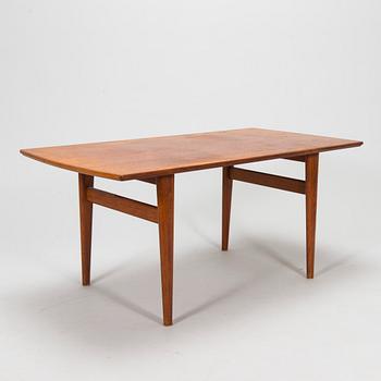 A 1960s teak coffee table.