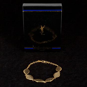 PUKUKORU, 3 osaa, Yves Saint Laurent.