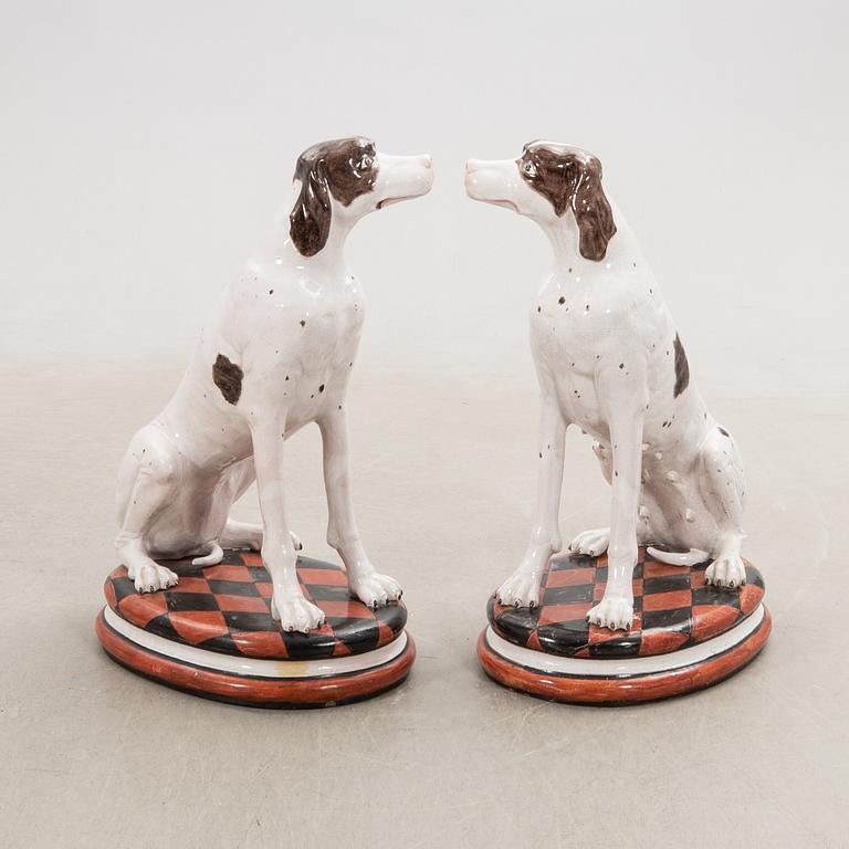 Decorative sculptures a pair England 20th century glazed ceramics.