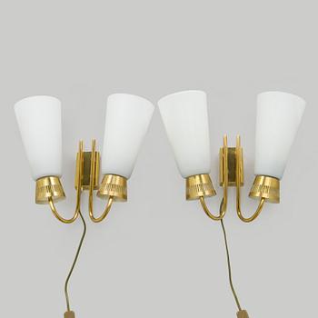 A pair of mid-20th century wall lights, model EY60, Itsu, Finland.