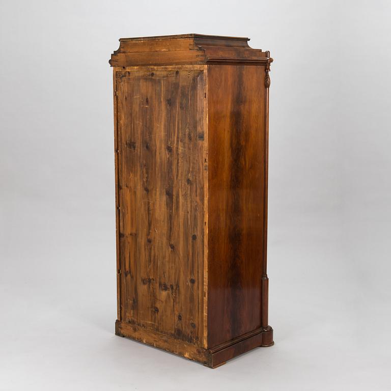 A Late Empire cabinet from the second quarter of the 19th century.