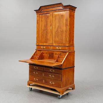 A partly 18th Century elm veneered writing cabinet.