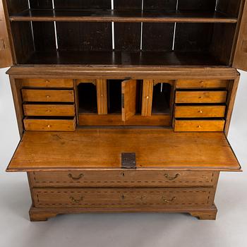 A late Baroque writing cupboard, mid 18th century. Probably Småland, Sweden.