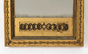 an Empire mirror, Sweden, early 19th century.