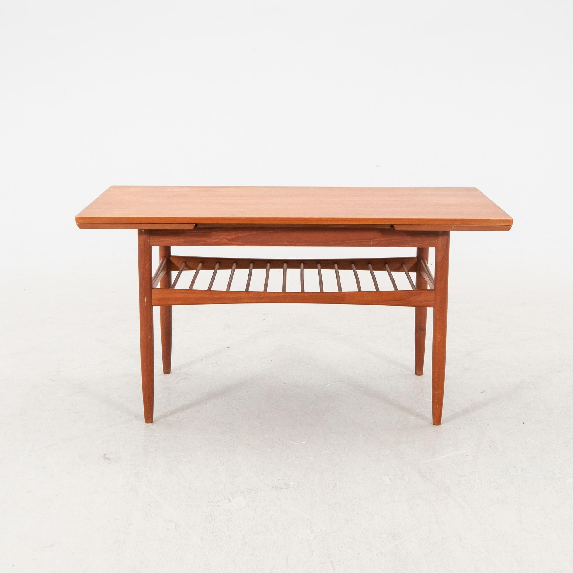A mid 1900s Danish teak coffee table.