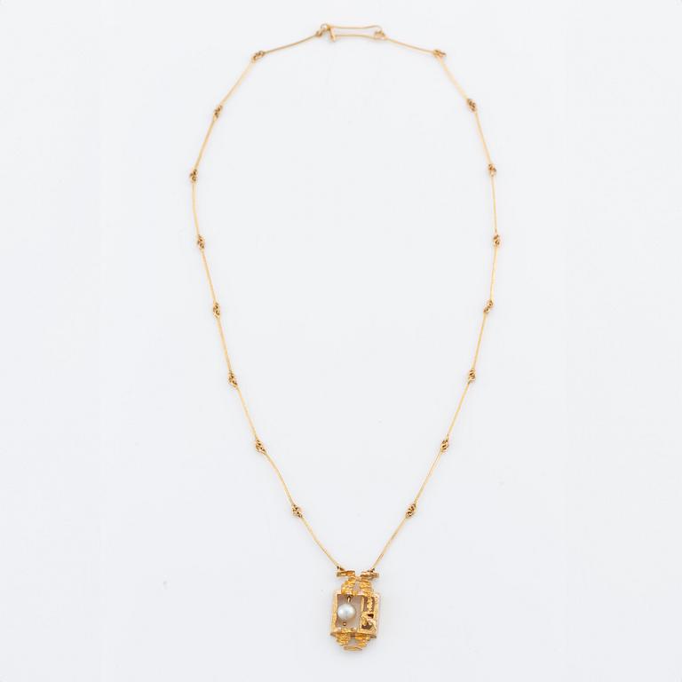 Lapponia, 14K gold necklace with a cultured pearl, designed by Björn Weckström "Magical Pearl".