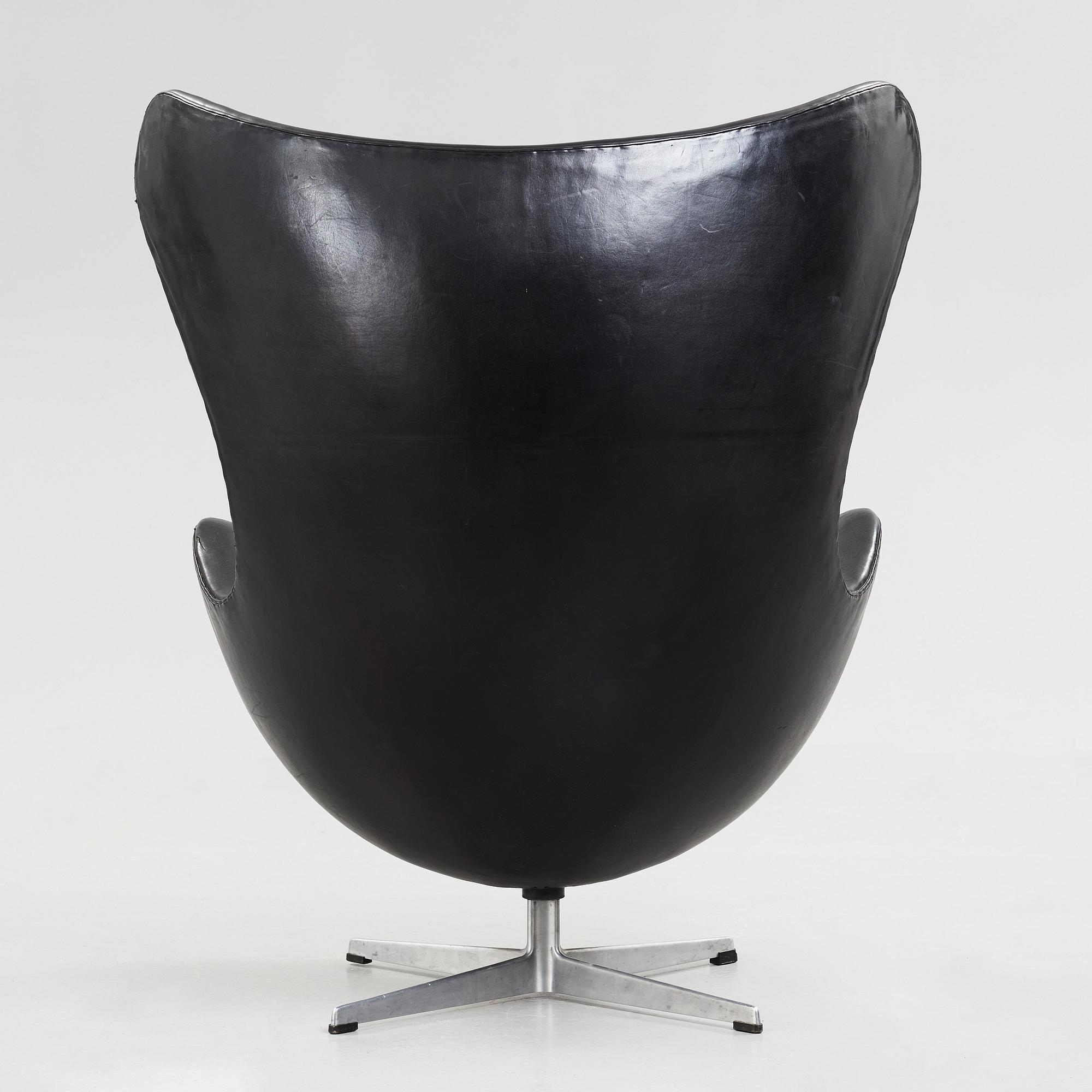 An Arne Jacobsen black leather 'Egg' chair, Fritz Hansen, Denmark 1960's.