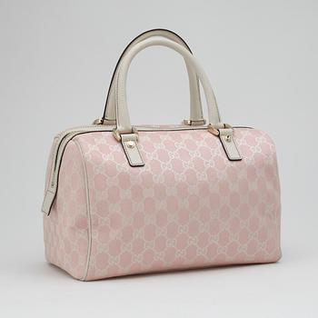 GUCCI, a pink monogram canvas handbag.