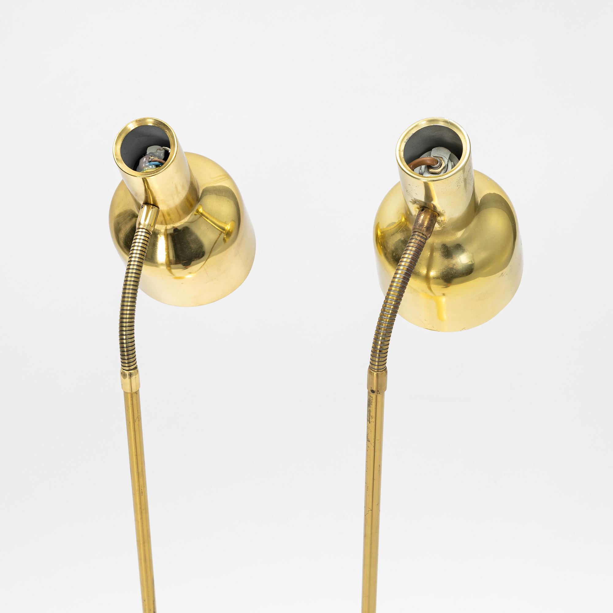 A pair of brass floor light from Möller Armatur, second part of the 20th Century.