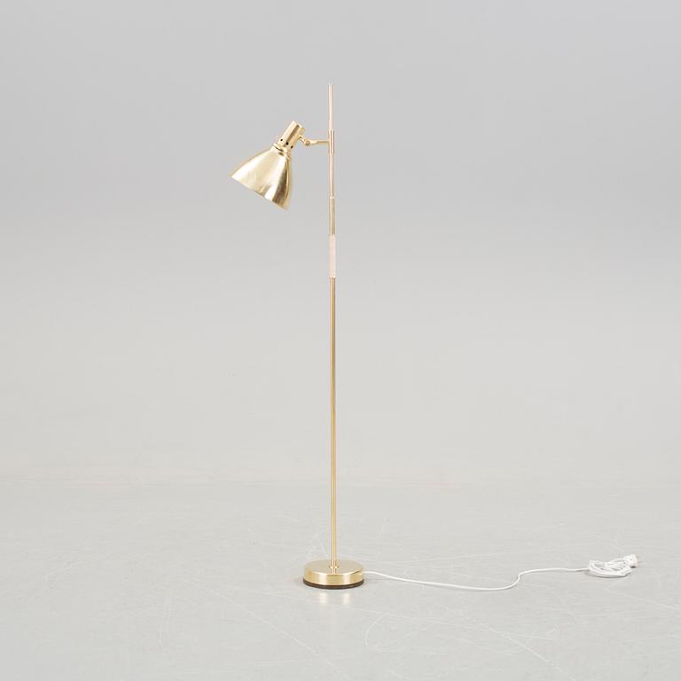 A brass standard light from the mid 20th century.