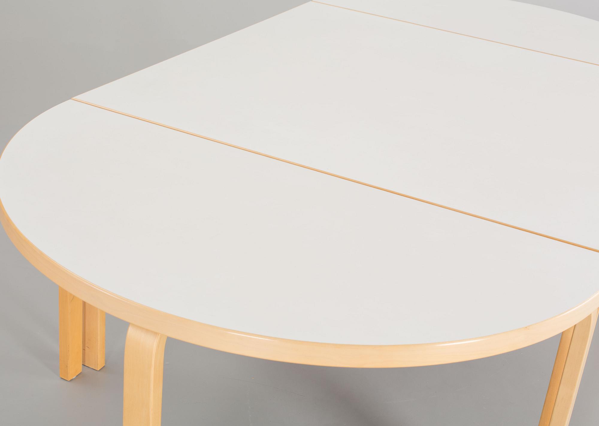 A SET OF 3 PARTS ALVAR AALTO DINING TABLE FROM ARTEK.