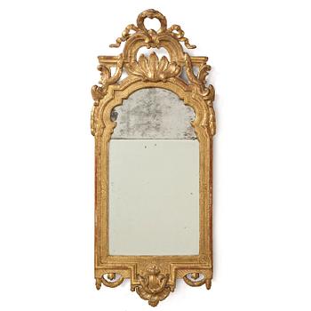 112. A Trasitional giltwood mirror by J. Åkerblad (master in Stockholm 1758-99).