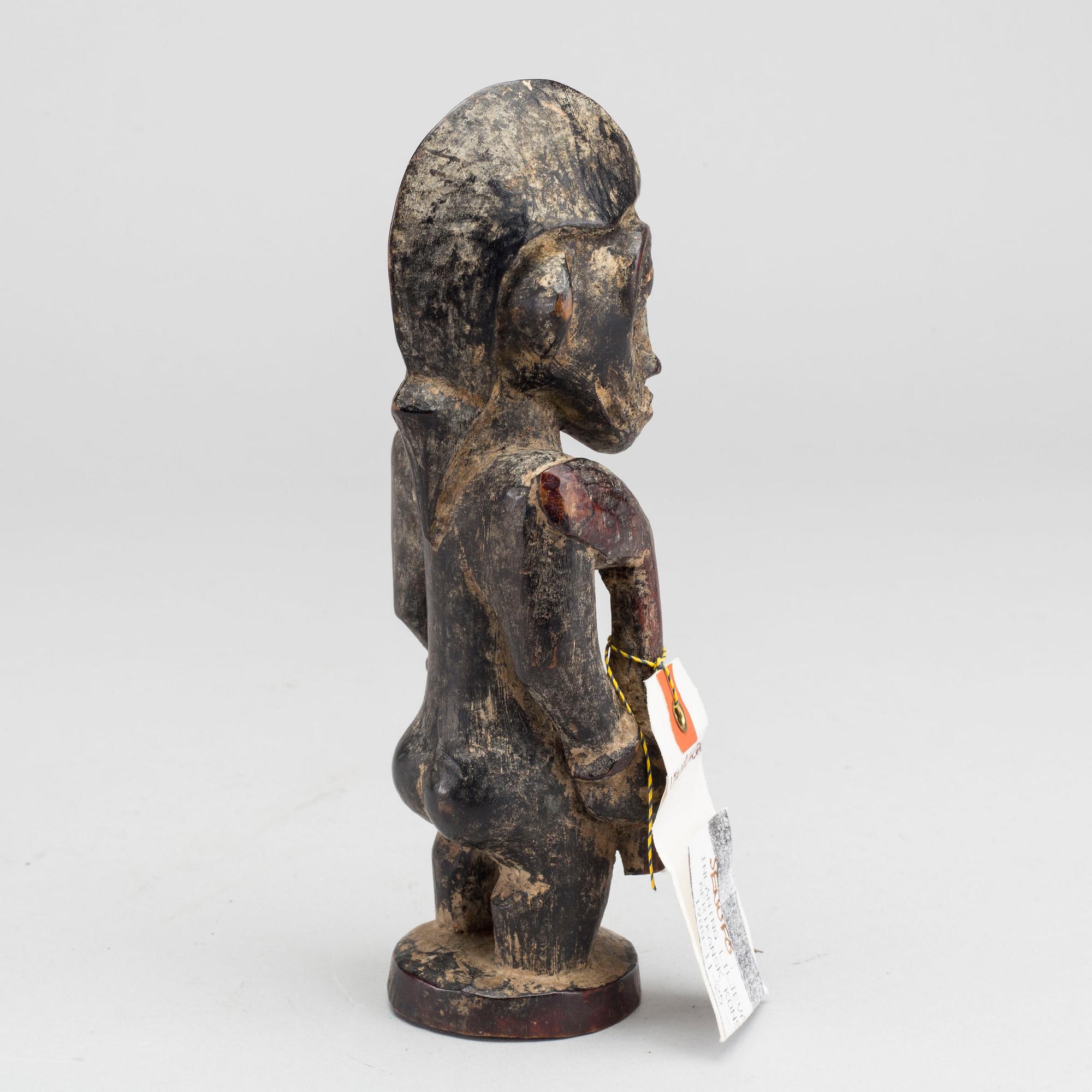 A SENUFO WOODEN FIGURE.